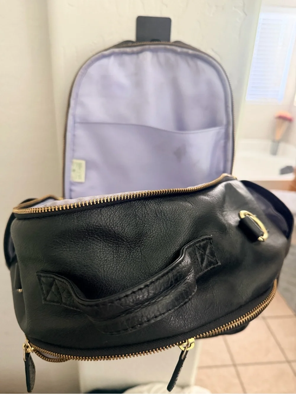 Lily Jade Black Leather Backpack with Tassel Accent